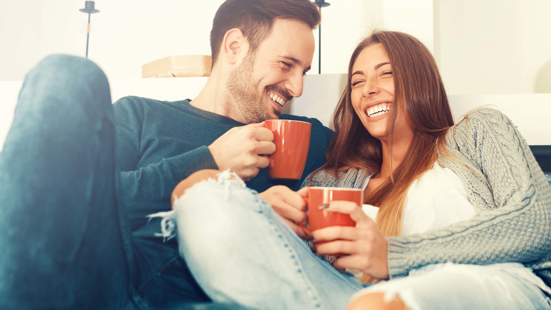 Couple enjoying coffee at home